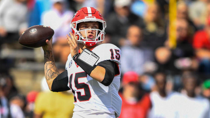 Oct 14, 2023; Nashville, Tennessee, USA;  Georgia Bulldogs quarterback Carson Beck (15) throws the ball against the Vanderbilt Commodores during the first half at FirstBank Stadium. Mandatory Credit: Steve Roberts-USA TODAY Sports