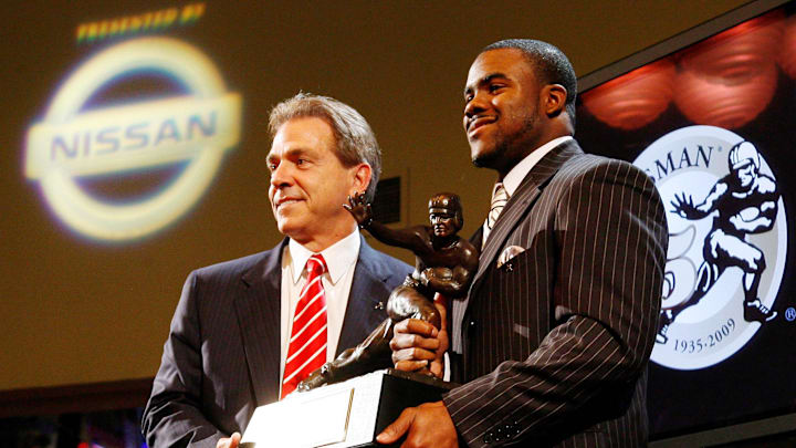 Dec 12, 2009; New York, NY, USA; Alabama Crimson Tide running back Mark Ingram (right) poses with his coach Nick Saban after being awarded the 2009 Heisman Trophy at the Marriott Marquis in New York City. 