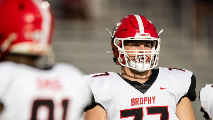 Brophy Prep Broncos tackle Logan Powell (77) prepares for a play against the Basha Bears at Basha High School's football field in Chandler on Sept. 28, 2023.