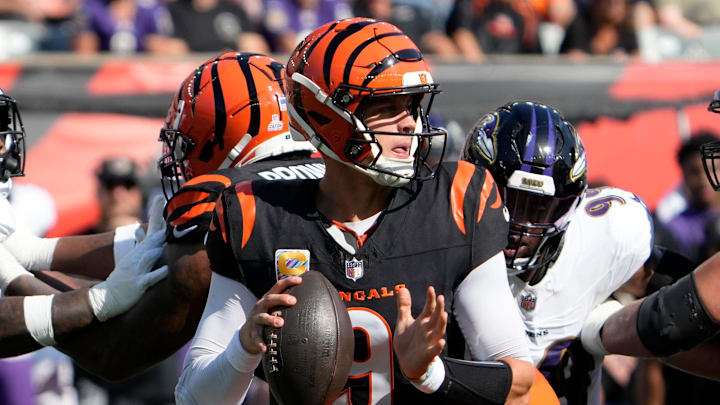 Cincinnati Bengals quarterback Joe Burrow (9) looks to make a pass against the Baltimore Ravens in the 3rd quarter on Sunday October 6, 2024 at Payor Stadium. Cincinnati Bengals quarterback Joe Burrow (9) looks to make a pass against the Baltimore Ravens in the 3rd quarter on Sunday October 6, 2024 at Payor Stadium.