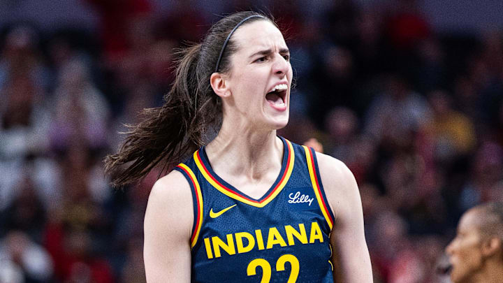 Jun 14, 2025; Indianapolis, Indiana, USA; Indiana Fever guard Caitlin Clark (22) celebrates a made basket in the first half against the New York Liberty at Gainbridge Fieldhouse. Mandatory Credit: Trevor Ruszkowski-Imagn Images