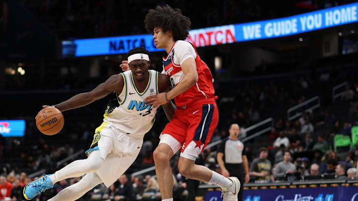 Feb 12, 2025; Washington, District of Columbia, USA; Indiana Pacers forward Pascal Siakam (43) drives to the basket as Washington Wizards forward Kyshawn George (18) defends in the third quarter at Capital One Arena. Mandatory Credit: Geoff Burke-Imagn Images