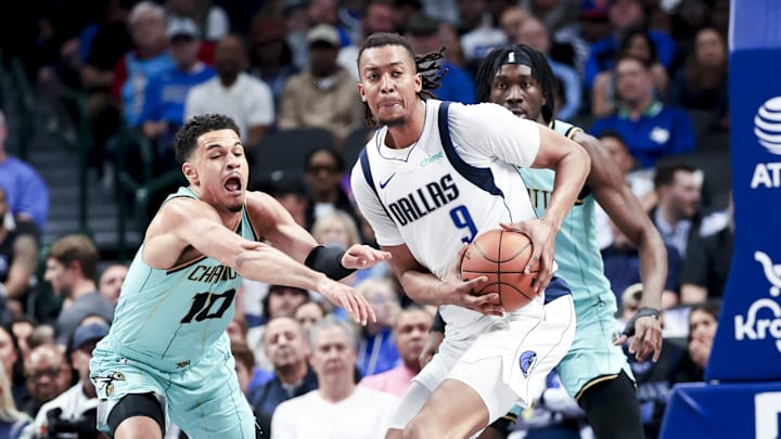 Feb 27, 2025; Dallas, Texas, USA; Dallas Mavericks center Moses Brown (9) looks to score as Charlotte Hornets guard Josh Green (10) defends during the first half at American Airlines Center. Mandatory Credit: Kevin Jairaj-Imagn Images Feb 27, 2025; Dallas, Texas, USA; Dallas Mavericks center Moses Brown (9) looks to score as Charlotte Hornets guard Josh Green (10) defends during the first half at American Airlines Center. Mandatory Credit: Kevin Jairaj-Imagn Images