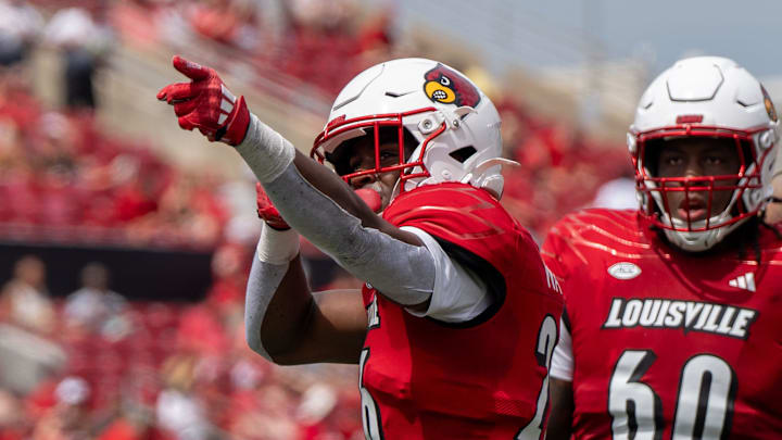 Louisville Cardinals running back Duke Watson (26) celebrates his play during their game against the Austin Peay Governors on Saturday, Aug. 31, 2024 at L&N Federal Credit Union Stadium in Louisville, Ky.