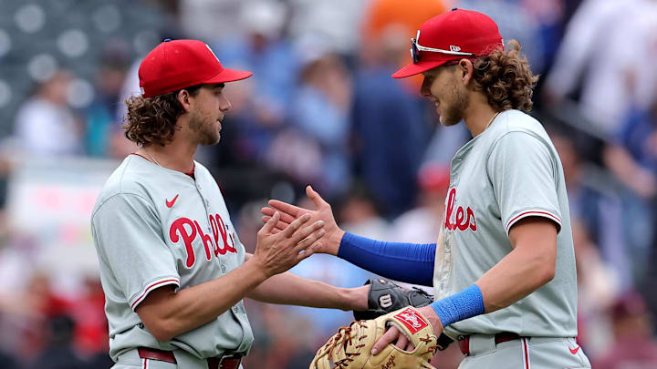 May 14, 2024; New York City, New York, USA; Philadelphia Phillies starting pitcher Aaron Nola (27) shakes hands with third baseman Alec Bohm (28) after defeating the New York Mets at Citi Field. May 14, 2024; New York City, New York, USA; Philadelphia Phillies starting pitcher Aaron Nola (27) shakes hands with third baseman Alec Bohm (28) after defeating the New York Mets at Citi Field.