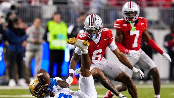 UCLA Bruins wide receiver Kwazi Gilmer (3) attempts to catch a pass against Ohio State Buckeyes cornerback Devin Sanchez (6) in the first half of the NCAA college football game at Ohio Stadium on Saturday, Nov. 15, 2025 in Columbus, Ohio.