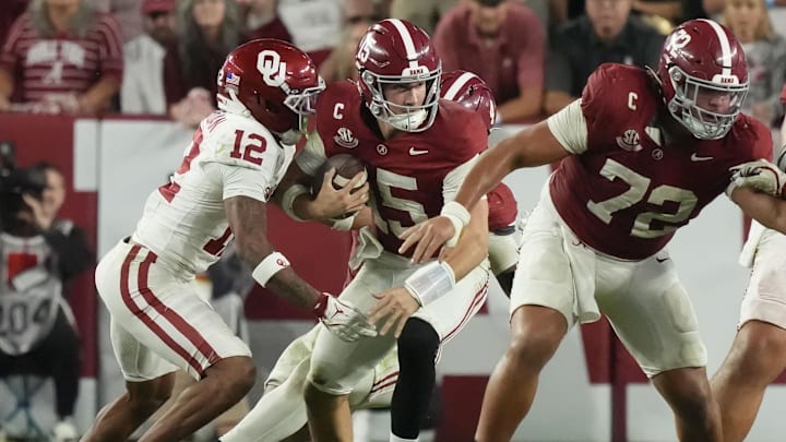 Nov 15, 2025; Tuscaloosa, Alabama, USA;  Oklahoma Sooners defensive back Devon Jordan (12) puts pressure on Alabama Crimson Tide quarterback Ty Simpson (15) at Saban Field at Bryant-Denny Stadium. Oklahoma defeated Alabama 23-21.