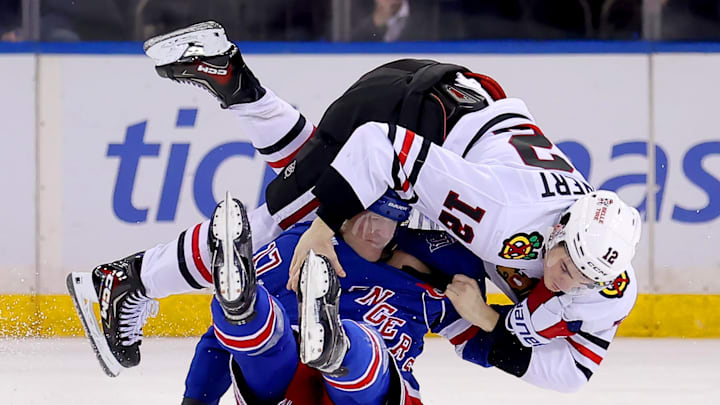 Mar 27, 2026; New York, New York, USA; Chicago Blackhawks center Sacha Boisvert (12) fights with New York Rangers defenseman Will Borgen (17) during the third period at Madison Square Garden. Mandatory Credit: Brad Penner-Imagn Images Mar 27, 2026; New York, New York, USA; Chicago Blackhawks center Sacha Boisvert (12) fights with New York Rangers defenseman Will Borgen (17) during the third period at Madison Square Garden. Mandatory Credit: Brad Penner-Imagn Images