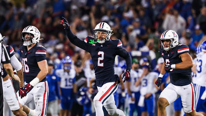Oct 11, 2025; Tucson, Arizona, USA; Arizona Wildcats defensive back Treydan Stokes (2) celebrates an interception he made during the second quarter against the Brigham Young Cougars at Arizona Stadium. Mandatory Credit: Aryanna Frank-Imagn Images