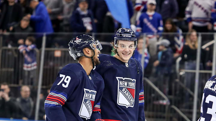 Mar 9, 2024; New York, New York, USA; New York Rangers center Matt Rempe (73) and defenseman K'Andre