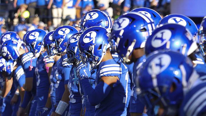 Oct 18, 2025; Provo, Utah, USA; The BYU Cougars warm up before the game against the Utah Utes at LaVell Edwards Stadium. Mandatory Credit: Rob Gray-Imagn Images