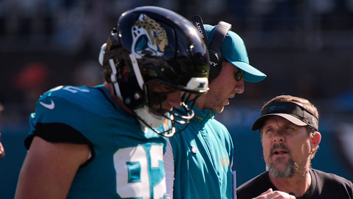 Jacksonville Jaguars head coach Liam Coen talks to one of his staff in the first quarter during an NFL football game at EverBank Stadium, Sunday, Dec. 14, 2025, in Jacksonville, Fla. [Doug Engle/Florida Times-Union]