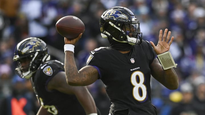 Dec 31, 2023; Baltimore, Maryland, USA; Baltimore Ravens quarterback Lamar Jackson (8) throws during the  during the first quarter against the Miami Dolphins at M&T Bank Stadium. Mandatory Credit: Tommy Gilligan-USA TODAY Sports