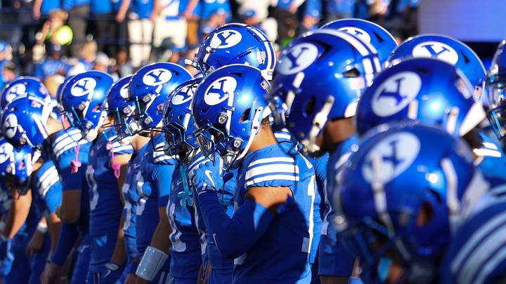 Oct 18, 2025; Provo, Utah, USA; The BYU Cougars warm up before the game against the Utah Utes at LaVell Edwards Stadium. Mandatory Credit: Rob Gray-Imagn Images