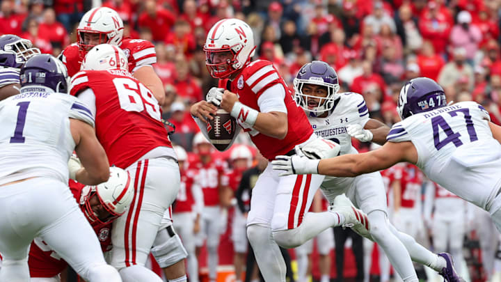 Nebraska quarterback Dylan Raiola fumbles after picking up a first down against Northwestern. Nebraska quarterback Dylan Raiola fumbles after picking up a first down against Northwestern.