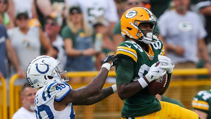 Green Bay Packers wide receiver Romeo Doubs catches a pass for a first down against the Indianapolis Colts.