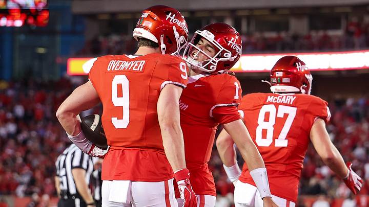 Oct 17, 2026; Houston, Texas, USA; Houston Cougars quarterback Conner Weigman (1) celebrates with tight end Patrick Overmyer (9) after a touchdown during the first quarter against the Oklahoma State Cowboys at TDECU Stadium. Mandatory Credit: Troy Taormina-Imagn Images Oct 17, 2026; Houston, Texas, USA; Houston Cougars quarterback Conner Weigman (1) celebrates with tight end Patrick Overmyer (9) after a touchdown during the first quarter against the Oklahoma State Cowboys at TDECU Stadium. Mandatory Credit: Troy Taormina-Imagn Images