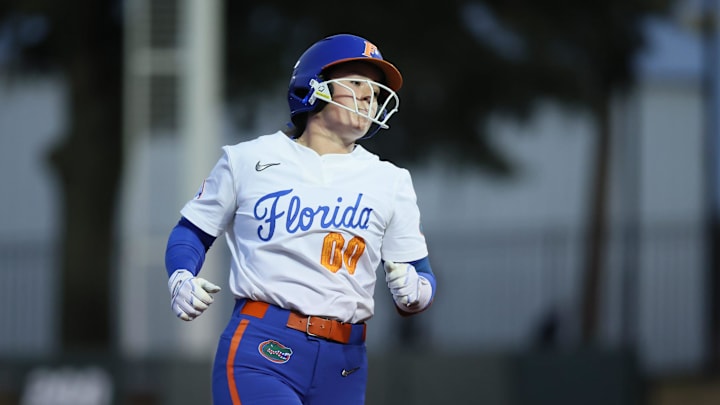 Florida starting pitcher/relief pitcher Ava Brown (00) runs the bases after her home runs during a NCAA softball game at Katie Seashole Pressly Stadium in Gainesville, FL on Wednesday, February 11, 2026. Florida beat Jacksonville in their home opener 11-1, [Alan Youngblood/Gainesville Sun]