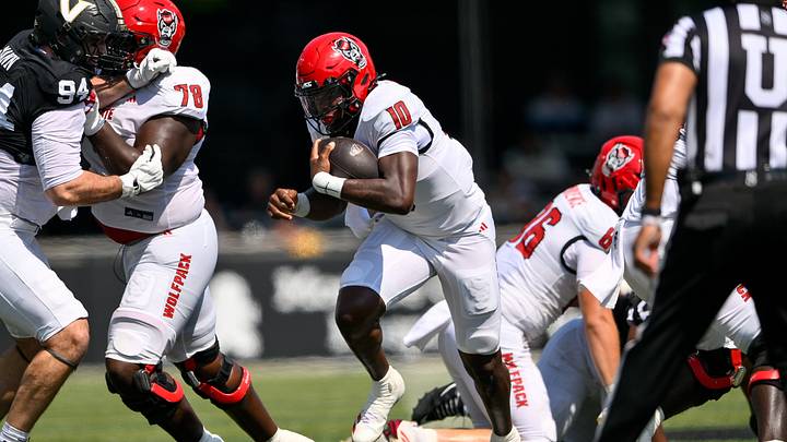 Sep 19, 2026; Nashville, Tennessee, USA; NC State Wolfpack quarterback Will Wilson (10) runs with the ball for a touchdown against the Vanderbilt Commodores during the first half at FirstBank Stadium. Mandatory Credit: Steve Roberts-Imagn Images Sep 19, 2026; Nashville, Tennessee, USA; NC State Wolfpack quarterback Will Wilson (10) runs with the ball for a touchdown against the Vanderbilt Commodores during the first half at FirstBank Stadium. Mandatory Credit: Steve Roberts-Imagn Images