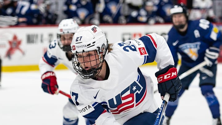 USA's Taylor Heise controls the puck at the Adirondack Bank Center in Utica, NY on Saturday, April 6, 2024. USA's Taylor Heise controls the puck at the Adirondack Bank Center in Utica, NY on Saturday, April 6, 2024.