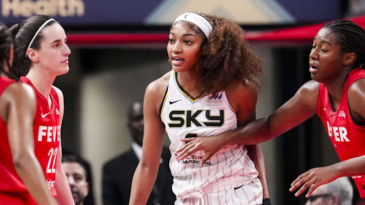 May 17, 2025; Indianapolis, IN, USA;  Chicago Sky forward Angel Reese (5) reacts to a flagrant foul from Indiana Fever guard Caitlin Clark (22) on Saturday, May 17, 2025, during a game between the Indiana Fever and the Chicago Sky at Gainbridge Fieldhouse in Indianapolis. The Indiana Fever defeated the Chicago Sky, 93-58.Mandatory Credit: Grace Smith-IndyStar via Imagn Images