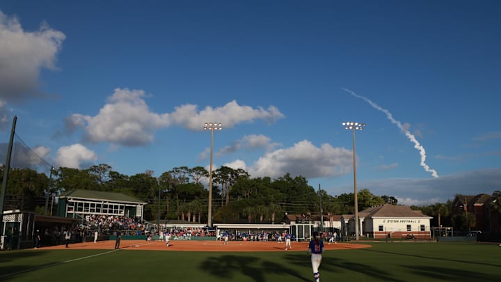 The Stetson and Florida softball teams paused their game on Wednesday to watch the launch of the Orion spacecraft.