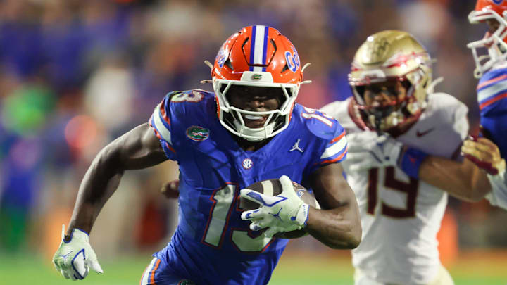 Florida running back Jadan Baugh (13) runs in for a touch down during the second half of an NCAA football game at Steve Spurrier Field at Ben Hill Griffin Stadium in Gainesville, FL on Saturday, November 29, Florida beat Florida State 40-21.2025. [Alan Youngblood/Gainesville Sun]