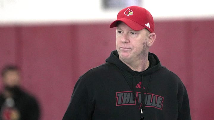 Louisville’s Jeff Brohm, Head Coach, watches everyone in football practice at the Trager Center. Louisville’s Jeff Brohm, Head Coach, watches everyone in football practice at the Trager Center.