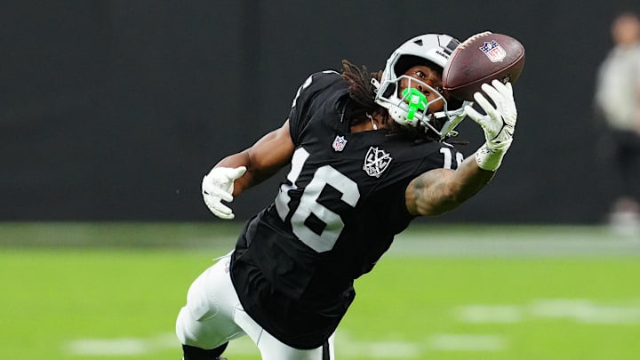 Sep 29, 2024; Paradise, Nevada, USA; Las Vegas Raiders wide receiver Jakobi Meyers (16) attempts to make a catch against the Cleveland Browns during the third quarter at Allegiant Stadium. Mandatory Credit: Stephen R. Sylvanie-Imagn Images Sep 29, 2024; Paradise, Nevada, USA; Las Vegas Raiders wide receiver Jakobi Meyers (16) attempts to make a catch against the Cleveland Browns during the third quarter at Allegiant Stadium. Mandatory Credit: Stephen R. Sylvanie-Imagn Images