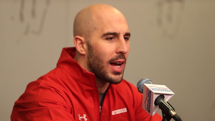 Feb 25, 2018; Madison, WI, USA; Feb 25, 2018; Madison, WI, USA; Philadephia Eagles safety Chris Maragos responds to a question at a pre-game news conference before the game between the Wisconsin Badgers and Michigan State Spartans at the Kohl Center. Maragos' last season with the Badgers was in 2009. Mandatory Credit: Mary Langenfeld-Imagn Images at the Kohl Center. Mandatory Credit: Mary Langenfeld-Imagn Images