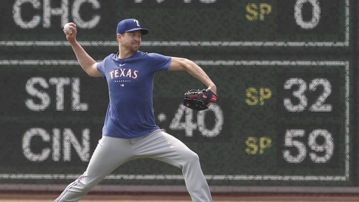 May 24, 2023; Pittsburgh, Pennsylvania, USA; Texas Rangers pitcher Jacob deGrom (48) throws in the outfield before the game against the Pittsburgh Pirates at PNC Park. Mandatory Credit: Charles LeClaire-USA TODAY Sports