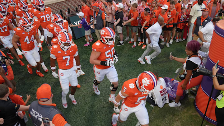 Clemson players enter the field before the game with Clemson and Louisiana State University at Memorial Stadium in Clemson, S.C. Saturday, August 30, 2025.