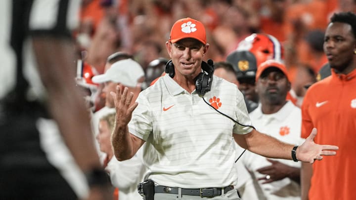 Clemson head coach Dabo Swinney communicates with a referee in the game with Louisiana State University during the second quarter at Memorial Stadium in Clemson, S.C. Saturday, Aug 30, 2025.