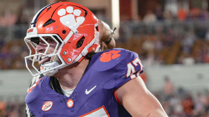 Clemson linebacker Sammy Brown (47) reacts after intercepting a pass against Furman during the second quarter at Memorial Stadium in Clemson, S.C. Saturday, November 22, 2025.