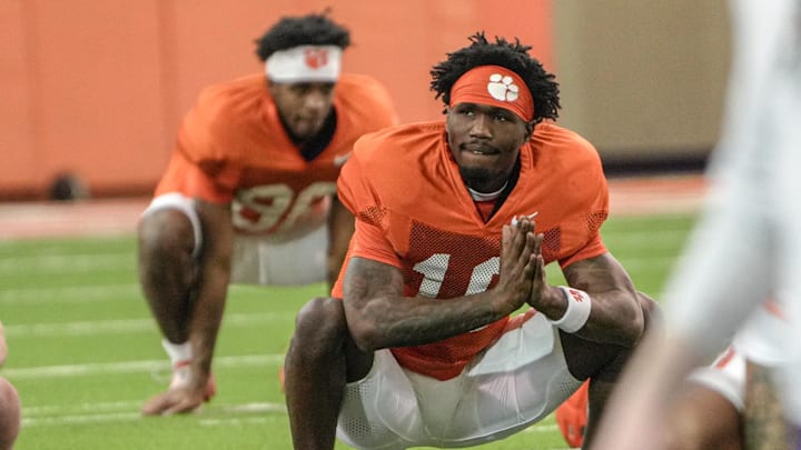 Clemson running back Chris Johnson Jr (16) stretches during Spring football practice at the Reeves Football Complex in Clemson, SC Wednesday, March 4, 2026. Clemson running back Chris Johnson Jr (16) stretches during Spring football practice at the Reeves Football Complex in Clemson, SC Wednesday, March 4, 2026.