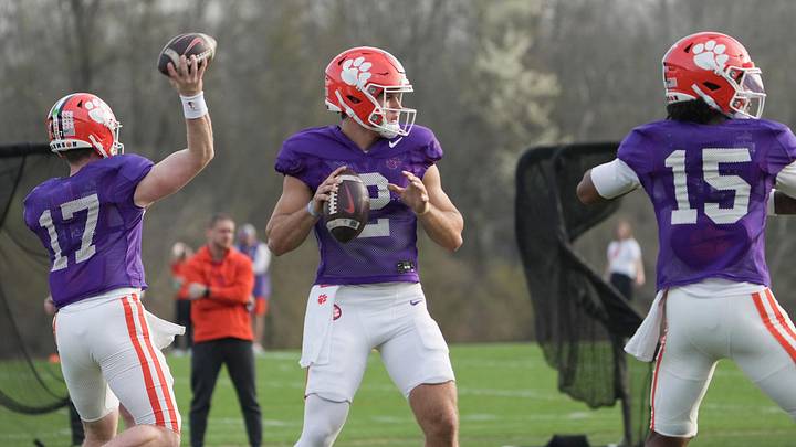 Clemson quarterback Tait Reynolds (2) throws with Christopher Vizzina (17), left, and Chris Denson (15) during Spring football practice at the Reeves Football Complex in Clemson, SC Wednesday, March 4, 2026. Clemson quarterback Tait Reynolds (2) throws with Christopher Vizzina (17), left, and Chris Denson (15) during Spring football practice at the Reeves Football Complex in Clemson, SC Wednesday, March 4, 2026.