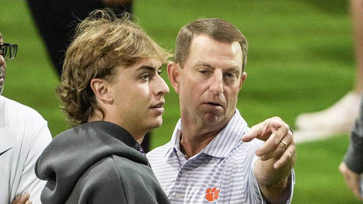 Clemson kicker Nolan Hauser, left, talks with head coach Dabo Swinney during 2026 Clemson Pro Day in the Poe Indoor Facility at Clemson University in Clemson Thursday, March 12, 2026. Clemson kicker Nolan Hauser, left, talks with head coach Dabo Swinney during 2026 Clemson Pro Day in the Poe Indoor Facility at Clemson University in Clemson Thursday, March 12, 2026.