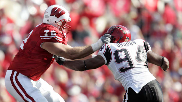 September 16, 2006; Madison, WI, USA; Wisconsin Badgers offensive lineman (72) Joe Thomas blocks San Diego State Aztecs defensive lineman (94) Nick Osborn during the game at Camp Randall Stadium. September 16, 2006; Madison, WI, USA; Wisconsin Badgers offensive lineman (72) Joe Thomas blocks San Diego State Aztecs defensive lineman (94) Nick Osborn during the game at Camp Randall Stadium.