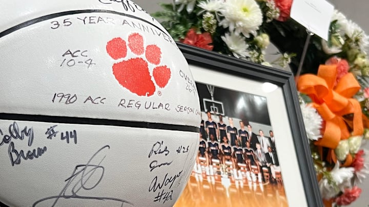 A display with ACC regular season champions, a team photo and flowers during a Memorial Service for Clemson Tigers basketball legend Elden Campbell at the Best Western in Clemson, S.C. Friday, Jan 16, 2026.