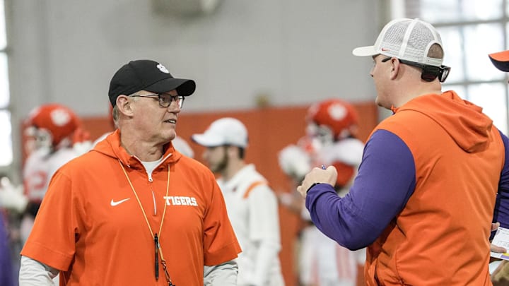Clemson defensive coordinator Tom Allen talks with son defensive pass coordinator Thomas Allen during Spring football practice at the Reeves Football Complex in Clemson, SC Wednesday, March 4, 2026. Clemson defensive coordinator Tom Allen talks with son defensive pass coordinator Thomas Allen during Spring football practice at the Reeves Football Complex in Clemson, SC Wednesday, March 4, 2026.
