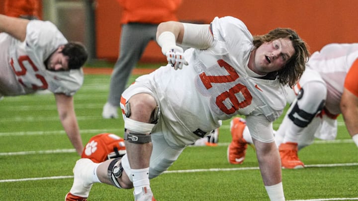 Clemson offensive lineman Blake Miller (78) warms up during the Pinstripe Bowl practice in Clemson, S.C. Monday, Dec. 15, 2025. Clemson offensive lineman Blake Miller (78) warms up during the Pinstripe Bowl practice in Clemson, S.C. Monday, Dec. 15, 2025.