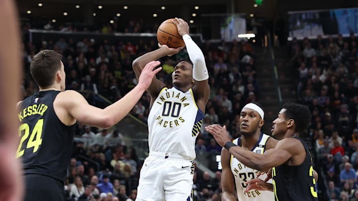 Jan 15, 2024; Salt Lake City, Utah, USA; Indiana Pacers guard Bennedict Mathurin (00) shoots the ball over Utah Jazz center Walker Kessler (24) during the second quarter at Delta Center. Mandatory Credit: Rob Gray-Imagn Images
