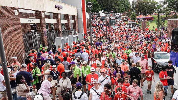 Fans walk to the stadium after Tiger Walk before the game at Memorial Stadium in Clemson, S.C.. Fans walk to the stadium after Tiger Walk before the game at Memorial Stadium in Clemson, S.C..