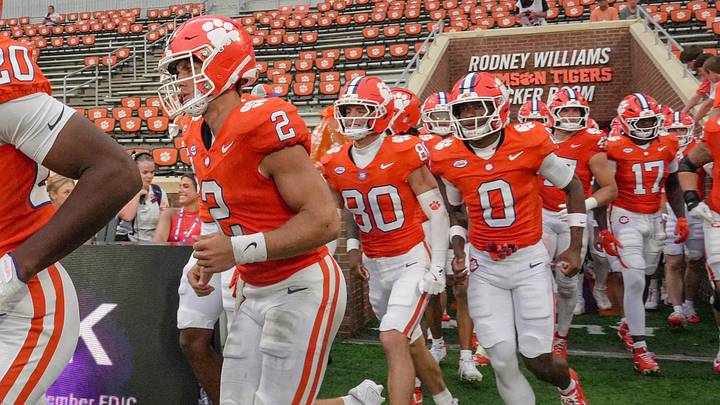 Clemson quarterback Tait Reynolds (2) and the team enter the field after a lightning delay the fourth quarter at Memorial Stadium Saturday, September 19, 2026. Clemson won the game playing University of North Carolina 28-20. Clemson quarterback Tait Reynolds (2) and the team enter the field after a lightning delay the fourth quarter at Memorial Stadium Saturday, September 19, 2026. Clemson won the game playing University of North Carolina 28-20.
