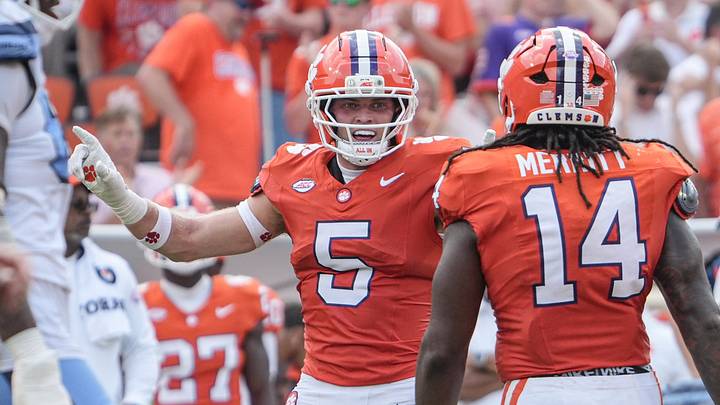 Clemson safety Ronan Hanafin (5) celebrates a defensive play with defensive end London Merritt (14) playing University of North Carolina during the third quarter at Memorial Stadium in Clemson, S.C. Saturday, September 19, 2026.