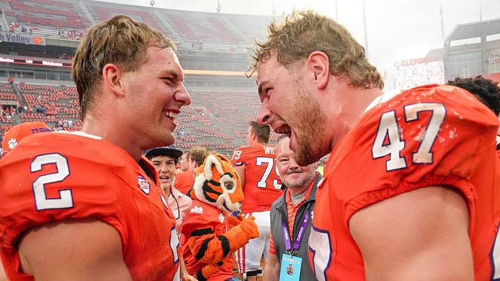 Clemson quarterback Tait Reynolds (2) and linebacker Sammy Brown (47) celebrate beating North Carolina Clemson quarterback Tait Reynolds (2) and linebacker Sammy Brown (47) celebrate beating North Carolina