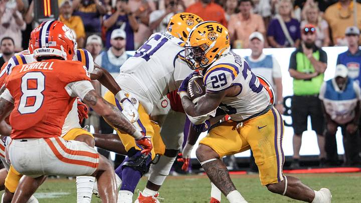 Louisiana State University running back Caden Durham (29) runs during the fourth quarter at Memorial Stadium in Clemson, S.C. Saturday, August 31, 2025. Louisiana State University running back Caden Durham (29) runs during the fourth quarter at Memorial Stadium in Clemson, S.C. Saturday, August 31, 2025.