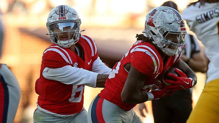 Oct 17, 2026; Oxford, Mississippi, USA; Mississippi Rebels quarterback Trinidad Chambliss (6) hands the ball off to running back Makhi Frazier (25) during the fourth quarter against the Missouri Tigers at Vaught-Hemingway Stadium. Mandatory Credit: Petre Thomas-Imagn Images Oct 17, 2026; Oxford, Mississippi, USA; Mississippi Rebels quarterback Trinidad Chambliss (6) hands the ball off to running back Makhi Frazier (25) during the fourth quarter against the Missouri Tigers at Vaught-Hemingway Stadium. Mandatory Credit: Petre Thomas-Imagn Images