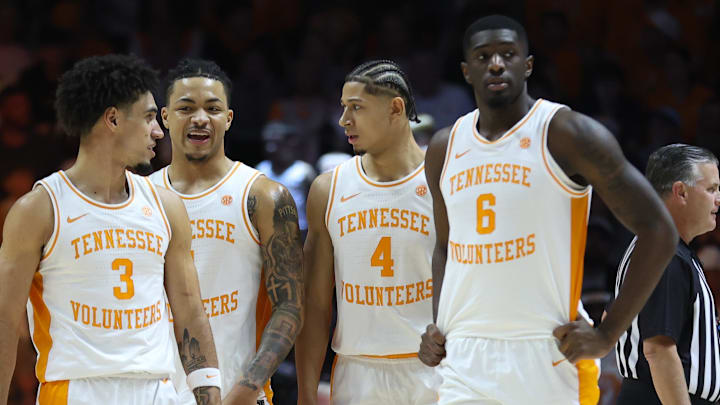 Dec 21, 2025; Knoxville, Tennessee, USA;  Tennessee Volunteers guard Bishop Boswell (3) and guard Amari Evans (1) and guard Clarence Massamba (4) and forward Dewayne Brown II (6) during the first half against the Gardner-Webb Runnin' Bulldogs at Thompson-Boling Arena at Food City Center. Mandatory Credit: Randy Sartin-Imagn Images