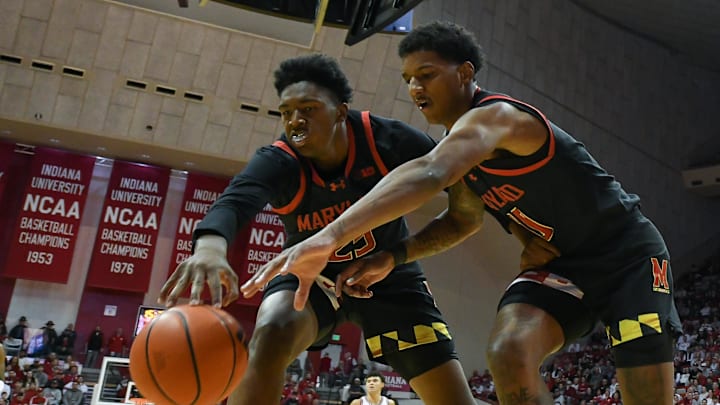 Jan 26, 2025; Bloomington, Indiana, USA; Maryland Terrapins center Derik Queen (25) and Maryland Terrapins forward Julian Reese (10) go for a loose ball during the first half against the Indiana Hoosiers at Simon Skjodt Assembly Hall. Mandatory Credit: Robert Goddin-Imagn Images